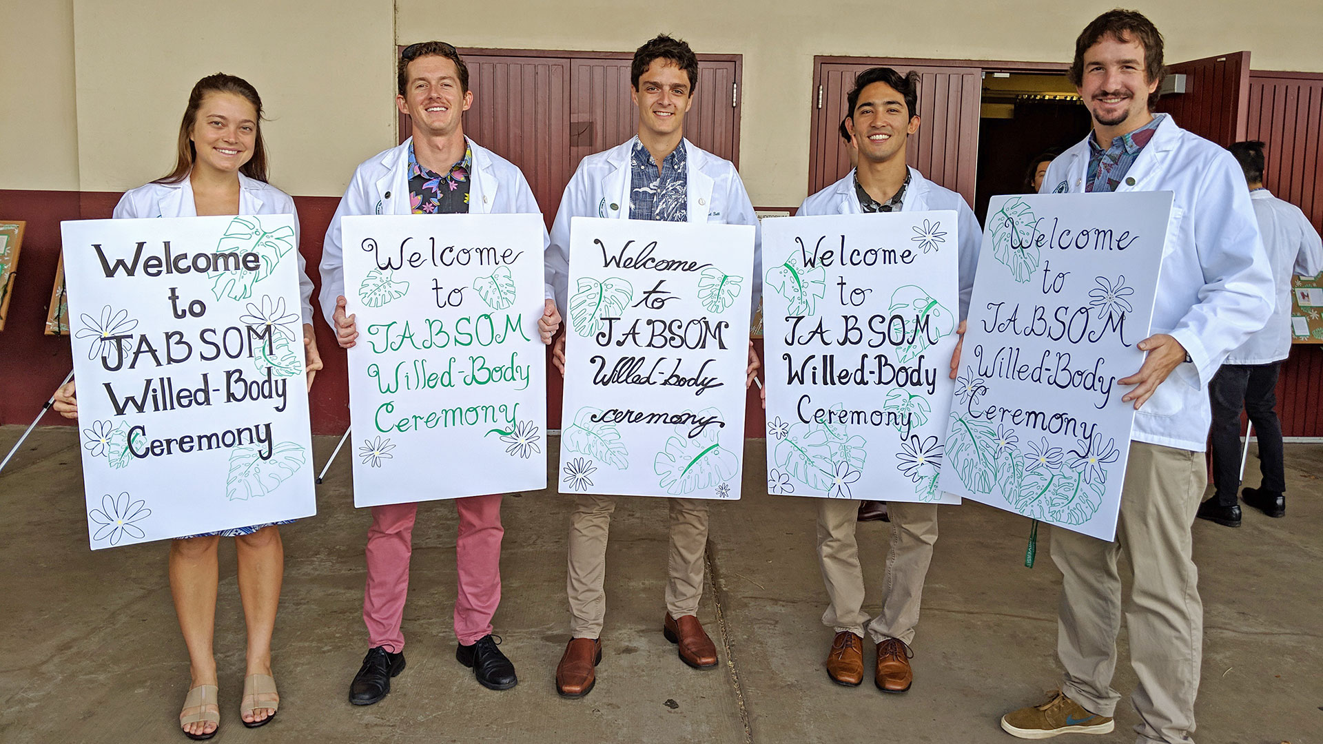willed body students holding ceremony posters