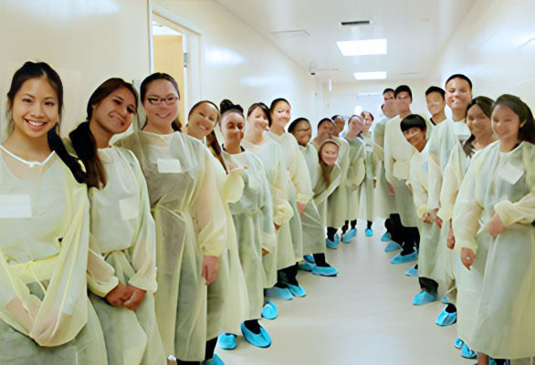 interested students in medical gown