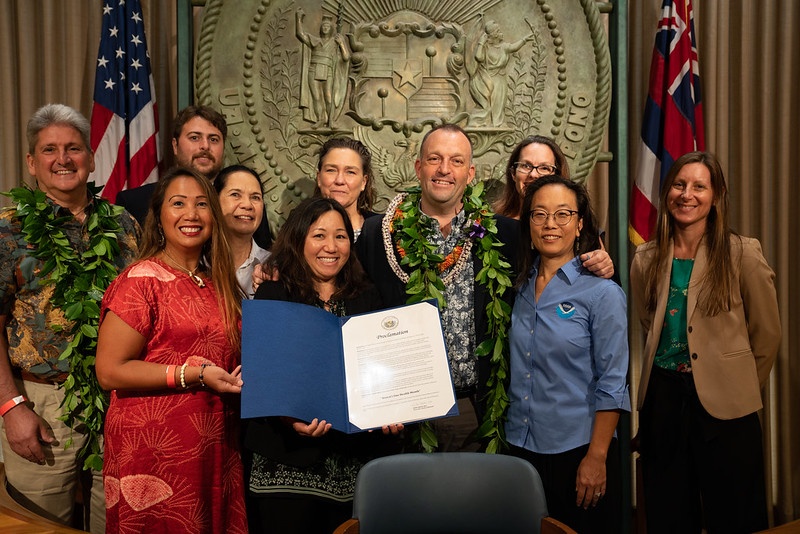 Featured photo: Gov. Josh Green, MD poses with UH Manoa One Health after signing the proclamation for One Health Hawaii Month.